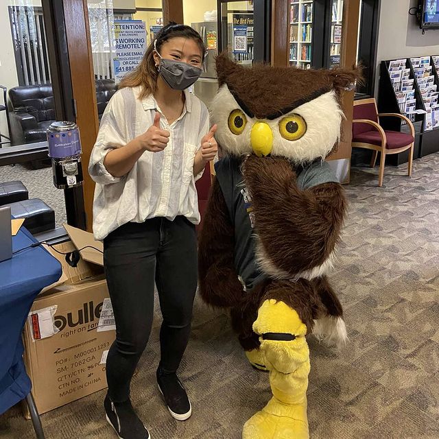 Hootie the Owl mascot and friend