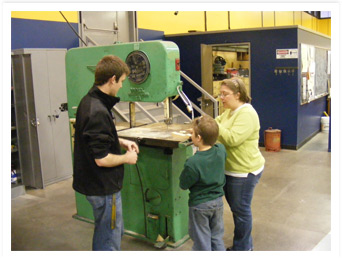 Cub Scouts learn more about the Band Saw