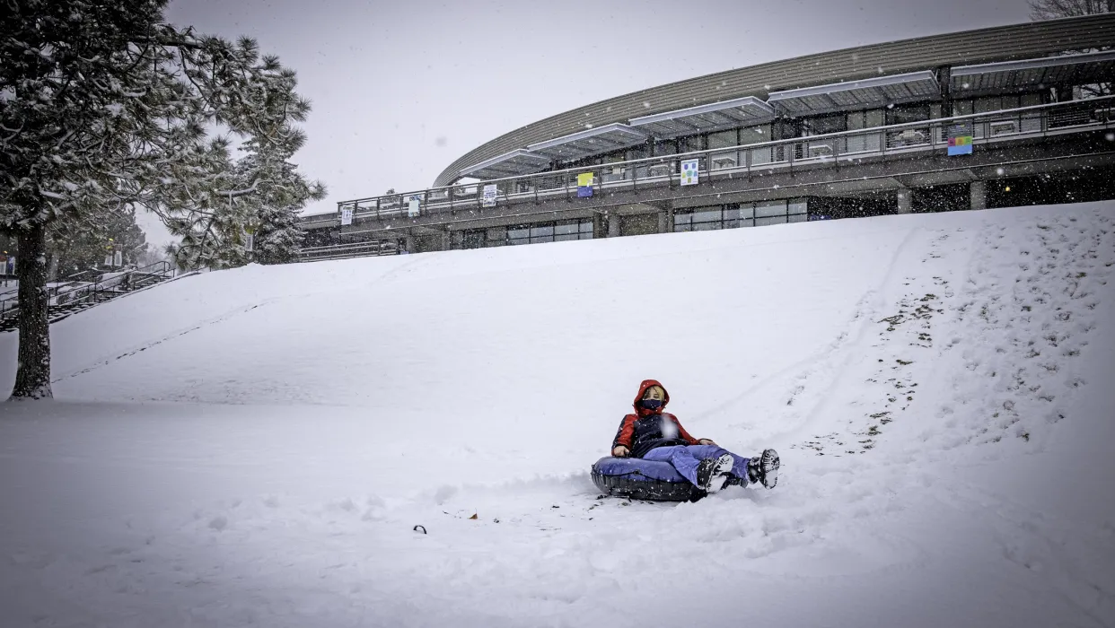 Winter 2022 - Sliding Down College Union Hill